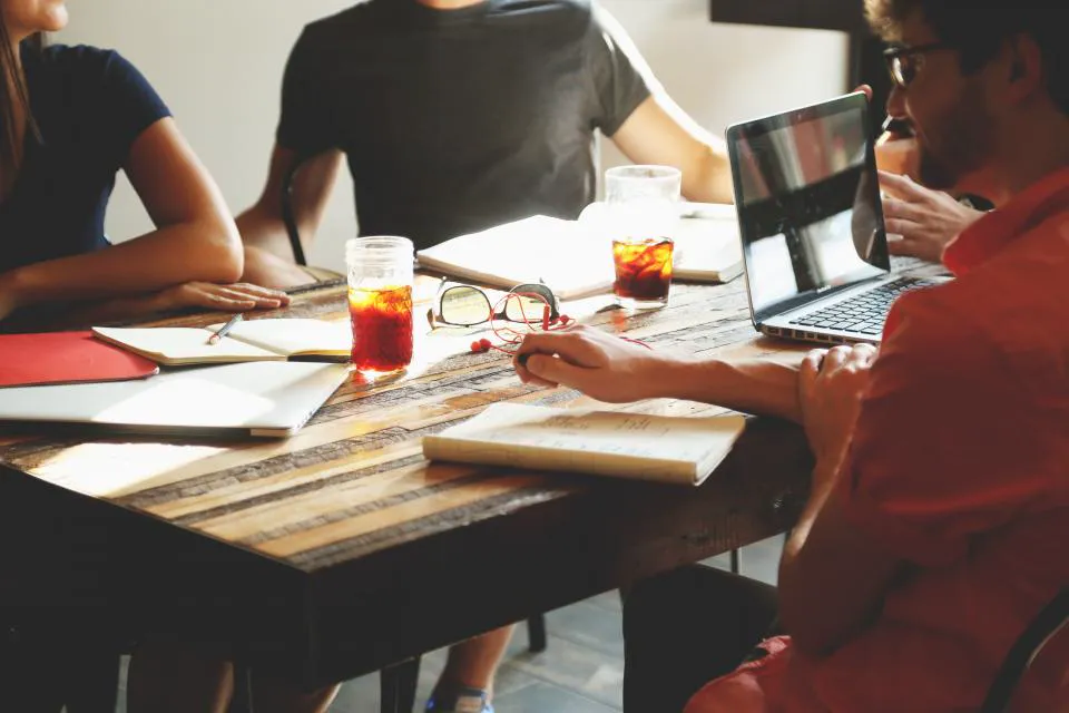 Team working together around a table